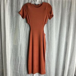 Missguided copper slinky bodycon short sleeve midi dress cut outs on each side.